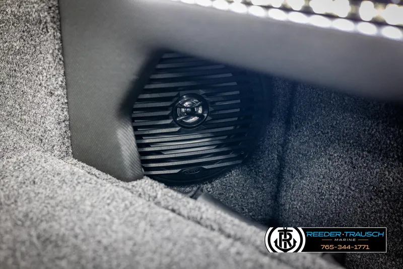 Slide: The Image of Speaker detail in 2025 Lund 1975 Tyee boat interior, featuring Reeder-Trausch Marine branding. - 38