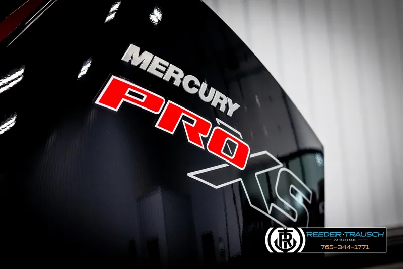 Slide: The Image of Mercury Pro XS engine on 2025 Lund 1975 Tyee boat, Reeder-Trausch Marine logo visible. - 43