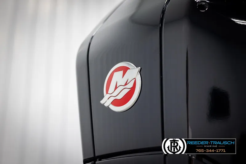 Slide: The Image of Close-up of 2025 Lund 1975 Tyee boat engine with logo. - 46