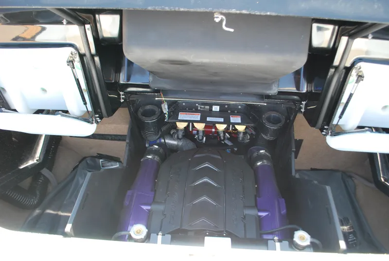 Slide: The Image of 2024 MasterCraft X26 engine compartment, showcasing powerful marine engine components. - 16