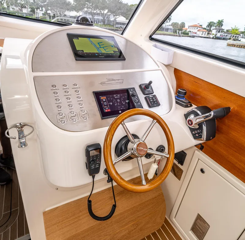 Slide: The Image of Gagliotta Lobster 35 helm with modern navigation equipment and wooden steering wheel, 2020 model. - 10