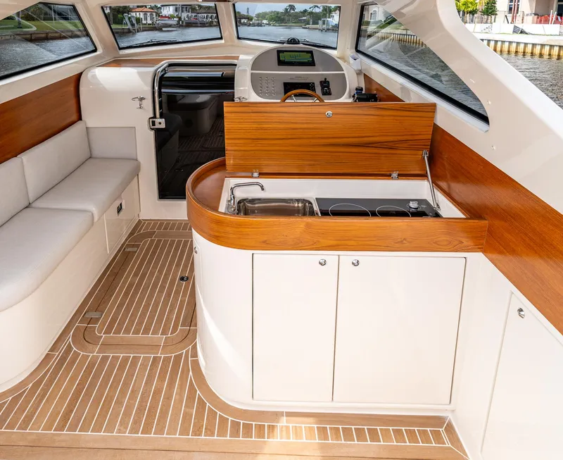 Slide: The Image of Interior of 2020 Gagliotta Lobster 35 boat with modern kitchen and seating area. - 12