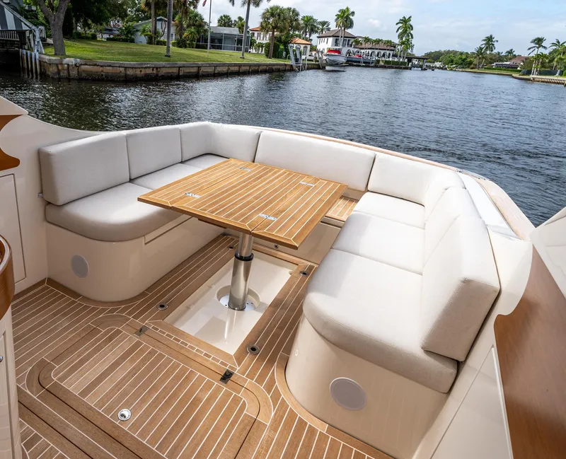 Slide: The Image of Luxurious seating area on 2020 Gagliotta Lobster 35 yacht by a scenic waterway. - 14