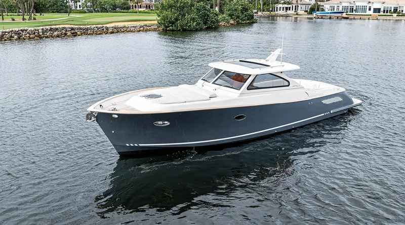 Slide: The Image of 2020 Gagliotta Lobster 35 boat cruising on a calm lake. - 22