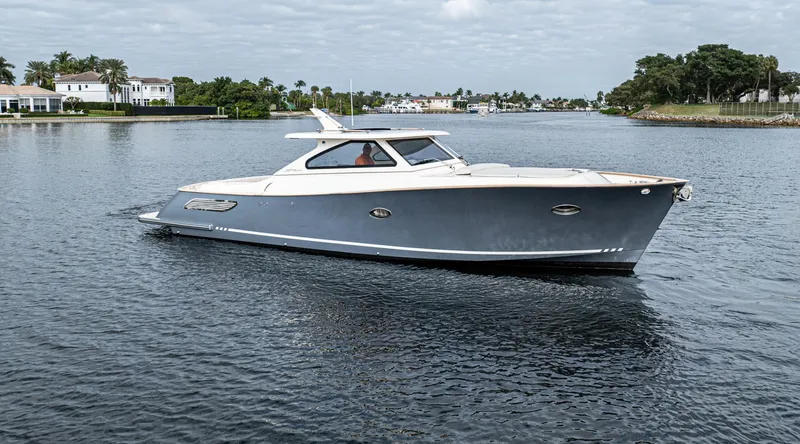 Slide: The Image of 2020 Gagliotta Lobster 35 cruising on a serene waterway. - 23