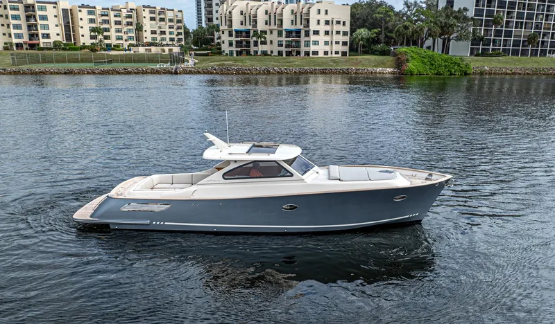 Slide: The Image of 2020 Gagliotta Lobster 35 boat on calm water near modern buildings. - 32