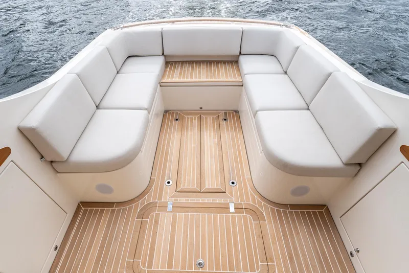 Slide: The Image of Gagliotta Lobster 35 boat interior, 2020 model, featuring elegant seating and wooden flooring. - 4