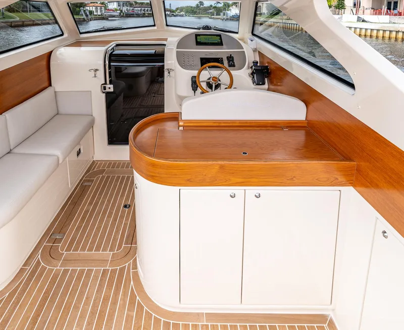 Slide: The Image of Interior of 2020 Gagliotta Lobster 35 boat with wood accents and modern design. - 5