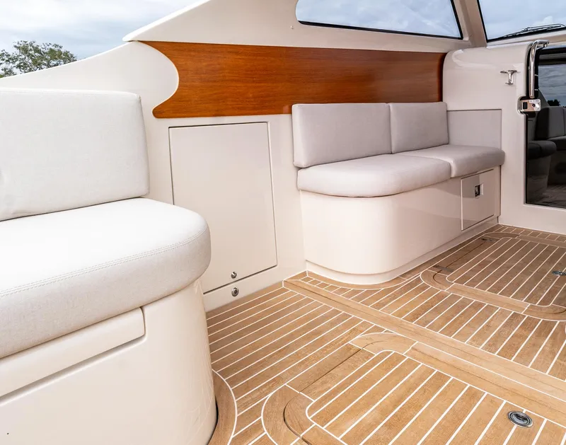 Slide: The Image of Luxurious interior of 2020 Gagliotta Lobster 35 yacht with elegant seating and wood accents. - 7