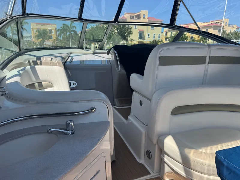 Slide: The Image of Interior of 2006 Sea Ray 320 Sundancer V-Drive boat with seating and sink. - 20