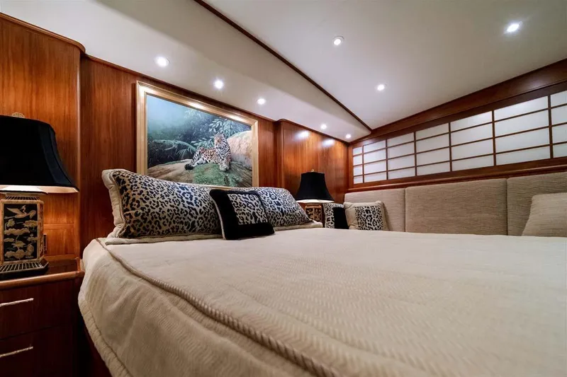 Slide: The Image of VIP Stateroom with Queen Walkaround Berth - 28