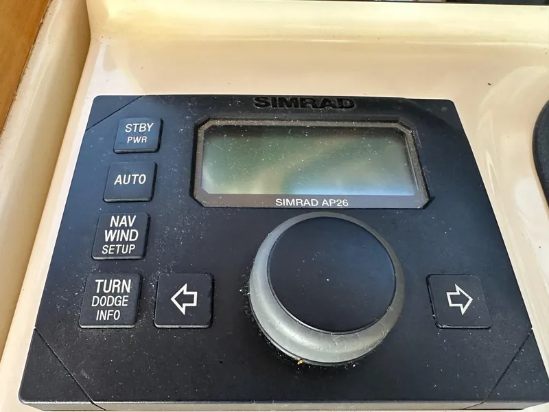 Slide: The Image of Simrad AP26 autopilot control panel on 2005 Sabre 42 Express yacht. - 15