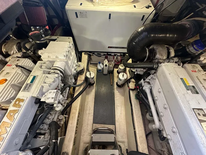 Slide: The Image of Engine room of 2005 Sabre 42 Express yacht with twin engines and generator. - 22