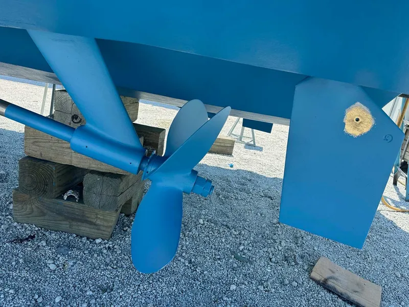 Slide: The Image of 2005 Sabre 42 Express boat propeller and hull on dry dock. - 32