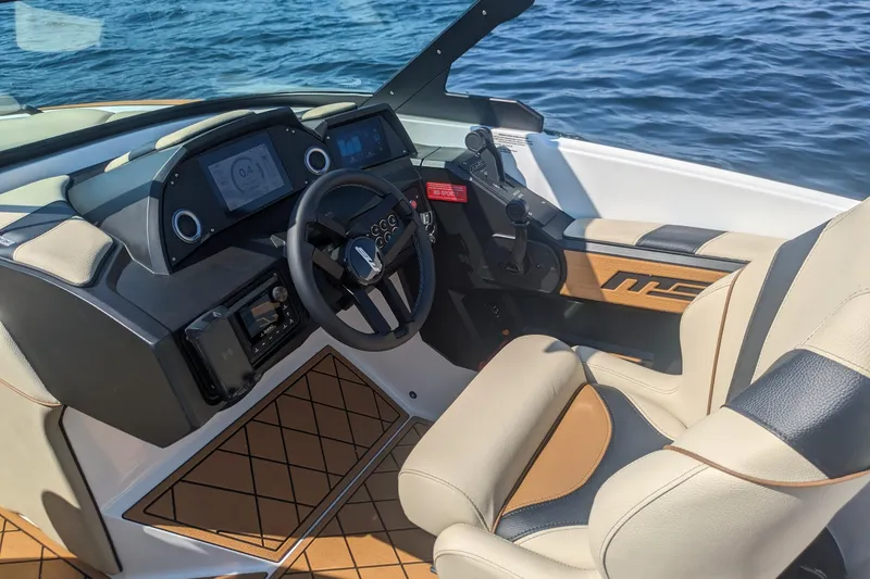 Slide: The Image of 2025 MB B52 25 Alpha boat cockpit with modern controls and luxurious seating. - 19