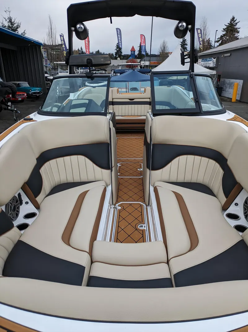 Slide: The Image of 2025 MB B52 25 Alpha boat interior with luxurious seating and modern design. - 9