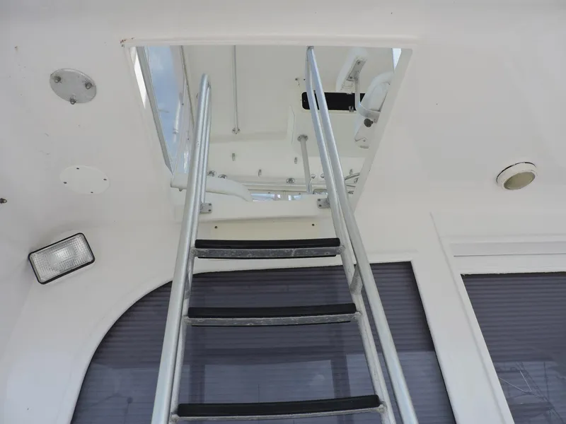 Slide: The Image of Ladder leading to upper deck on 1990 Post 44 boat. - 14