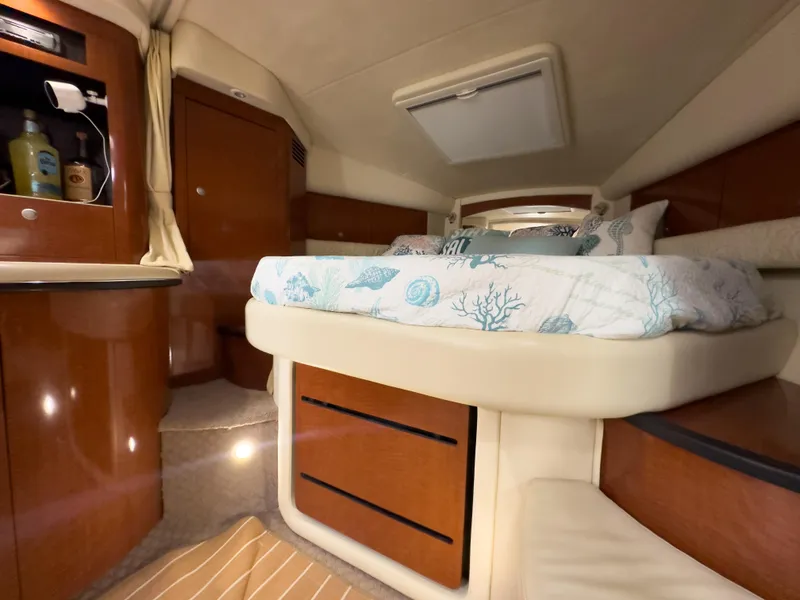 Slide: The Image of Luxurious cabin interior of 2005 Sea Ray 340 Sundancer yacht with cozy bed. - 19