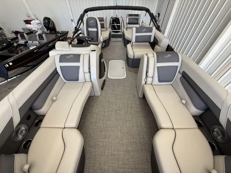 Slide: The Image of 2025 Barletta C22M pontoon boat interior with luxurious seating and modern design. - 24