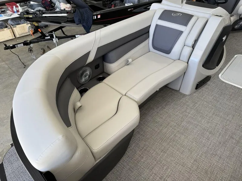Slide: The Image of 2025 Barletta C22M boat interior with gray seating and modern design. - 4