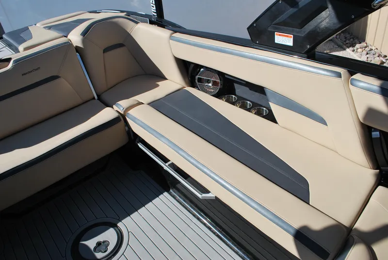 Slide: The Image of 2022 MasterCraft XStar interior with beige seating and modern design. - 11