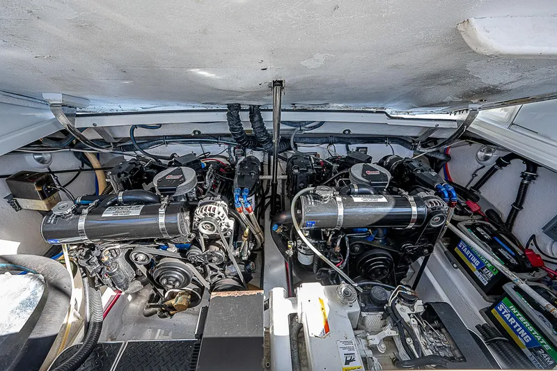 Slide: The Image of 2003 Formula 330 SS Super Sport engine compartment with dual engines and batteries. - 29