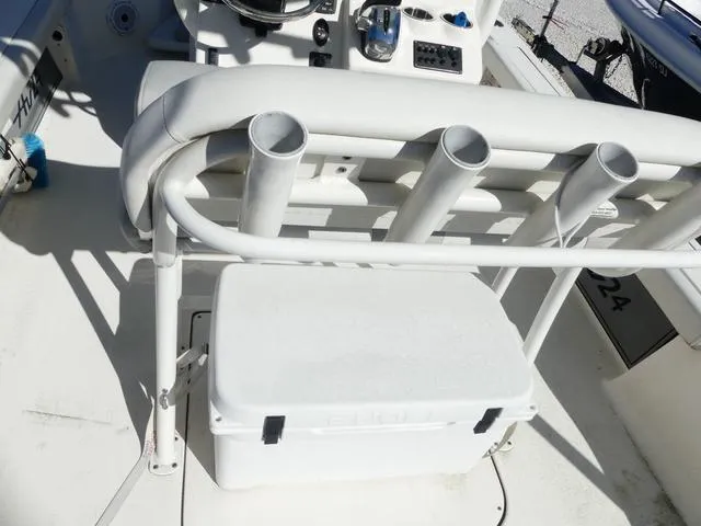 Slide: The Image of Avenger Boats AV24 2021 model with rod holders and storage cooler. - 18