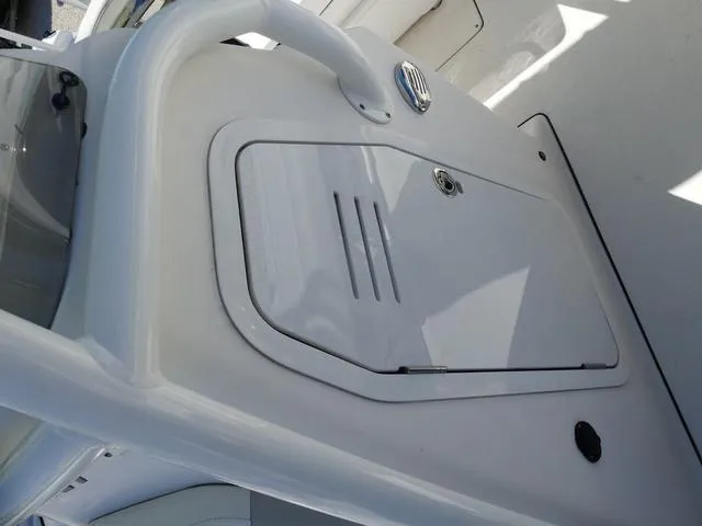 Slide: The Image of 2021 Avenger Boats AV24 console with storage compartment. - 20
