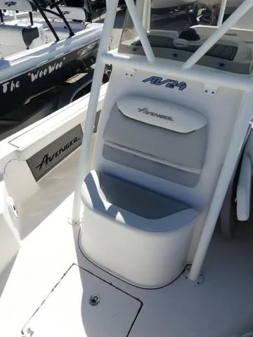 Slide: The Image of 2021 Avenger Boats AV24 interior seating and console detail. - 26