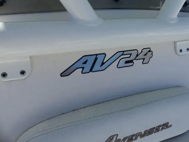 Slide: The Image of Avenger Boats AV24 2021 model logo on white boat surface. - 28