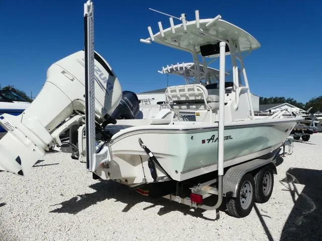 Slide: The Image of 2021 Avenger Boats AV24 on trailer, featuring powerful outboard motor. - 4