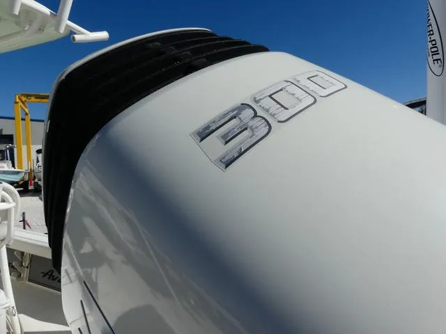 Slide: The Image of Avenger Boats AV24 2021 model with 300 horsepower engine, close-up view. - 7