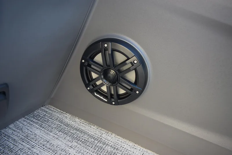 Slide: The Image of 2025 Bennington 23 SSBSE boat speaker detail on carpeted floor. - 20