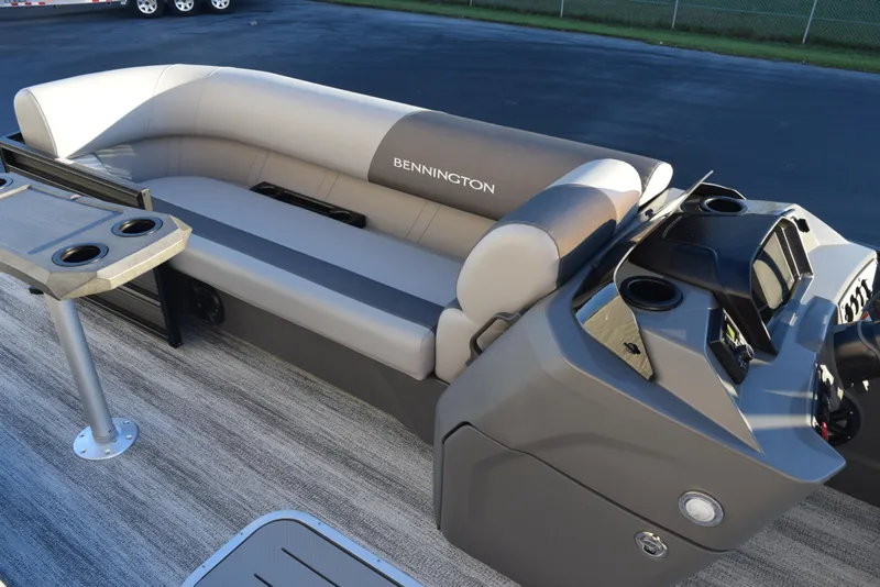 Slide: The Image of 2025 Bennington 23 SSBSE boat interior with plush seating and modern console. - 8