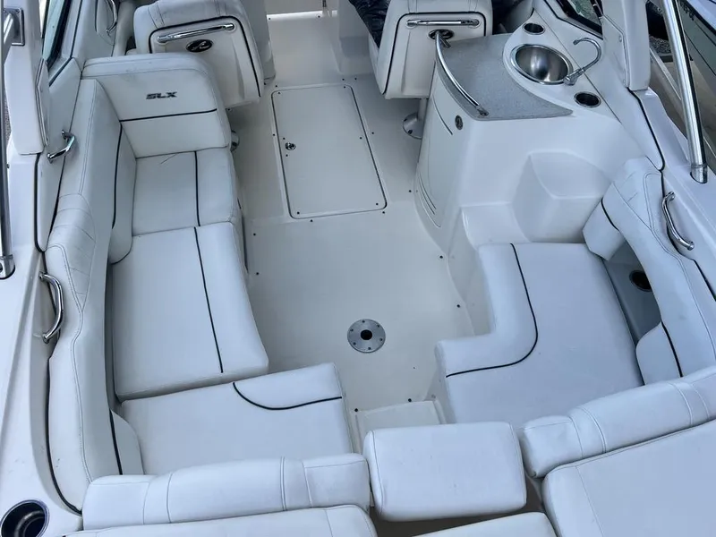 Slide: The Image of Interior of 2008 Sea Ray 270 SLX boat with white seating and sink. - 18