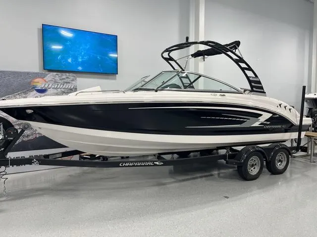 Slide: The Image of 2025 Chaparral 23 SSi boat on trailer in showroom. - 0