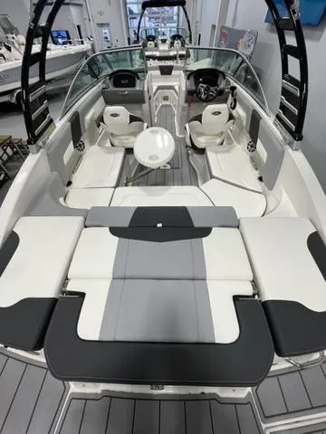 Slide: The Image of 2025 Chaparral 23 SSi boat interior with modern seating and sleek design. - 7