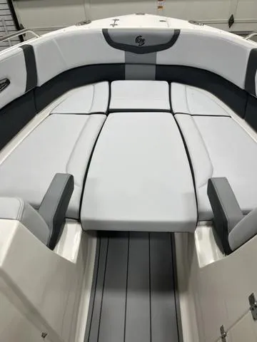 Slide: The Image of 2025 Chaparral 30 Surf boat interior with sleek helm and modern seating. - 11