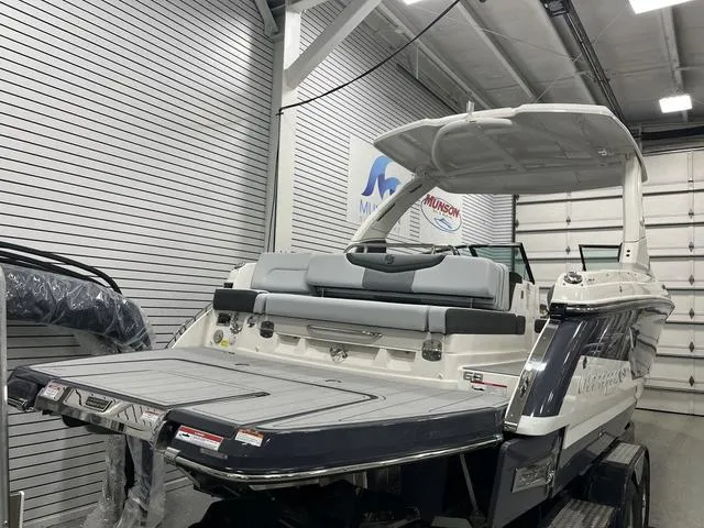 Slide: The Image of 2025 Chaparral 30 Surf boat interior with modern helm and seating. - 3