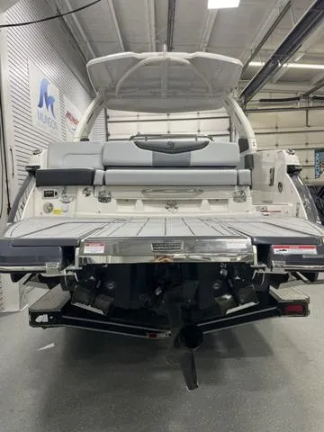 Slide: The Image of 2025 Chaparral 30 Surf boat with spacious rear deck and seating. - 4