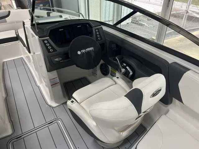 Slide: The Image of 2025 Chaparral 247 SSX boat interior with luxurious seating and modern design. - 5