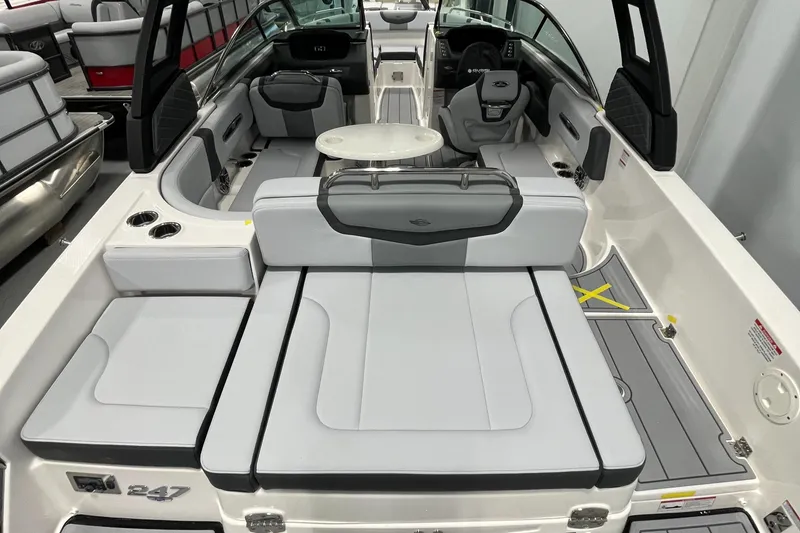 Slide: The Image of 2025 Chaparral 247 SSX boat interior with spacious seating and modern design. - 2