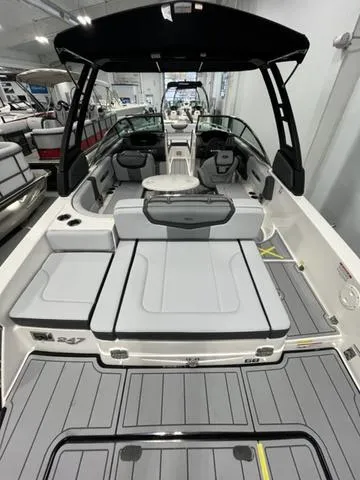 Slide: The Image of 2025 Chaparral 247 SSX boat interior with sleek seating and modern design. - 3