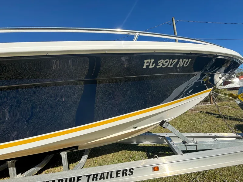 Slide: The Image of 2002 Marlago 35 FS boat on trailer, side view with registration number FL 3917 NU. - 10