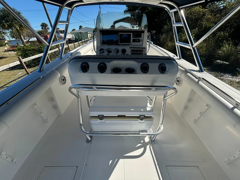 Slide: The Image of 2002 Marlago 35 FS boat interior with steering console and seating. - 17