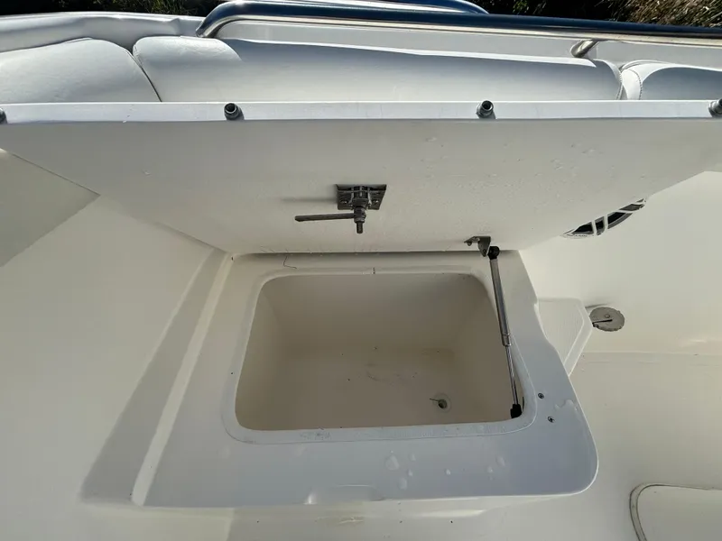 Slide: The Image of Open storage compartment on 2002 Marlago 35 FS boat. - 25