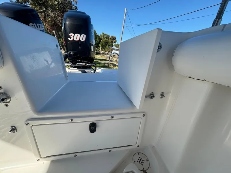 Slide: The Image of 2002 Marlago 35 FS boat interior with Suzuki 300 outboard engines. - 37