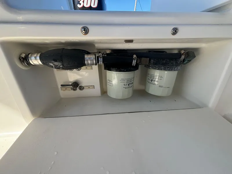 Slide: The Image of Fuel filters and pump system on a 2002 Marlago 35 FS boat. - 38