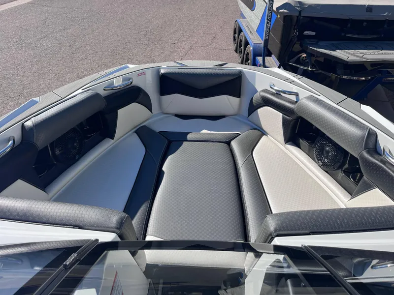 Slide: The Image of 2025 Supreme S240 boat interior with luxurious seating and modern design. - 12