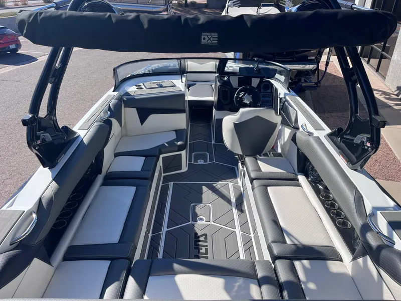Slide: The Image of 2025 Supreme S240 boat interior with modern seating and sleek design. - 4